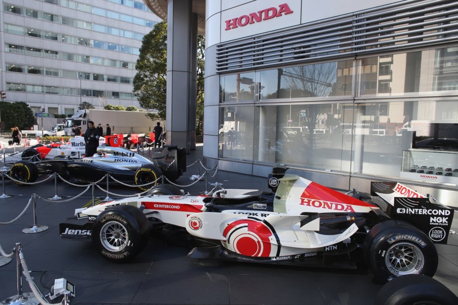 A modified Formula 1 car is parked at Honda headquarters after setting a world record.