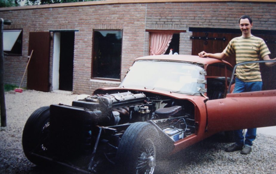 film photograph of the disassembled Jaguar E-Type barn find