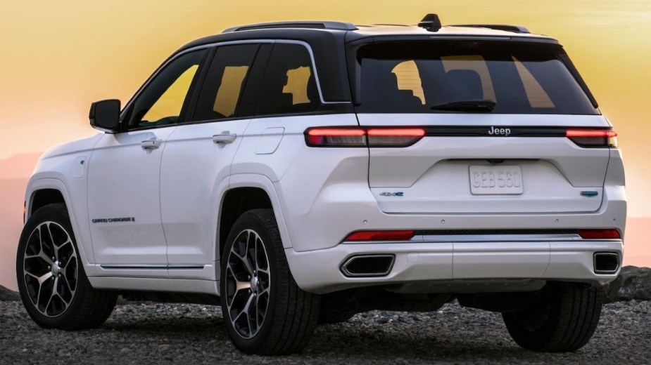 Rear View of a White Jeep Grand Cherokee 4xe with a sunset background
