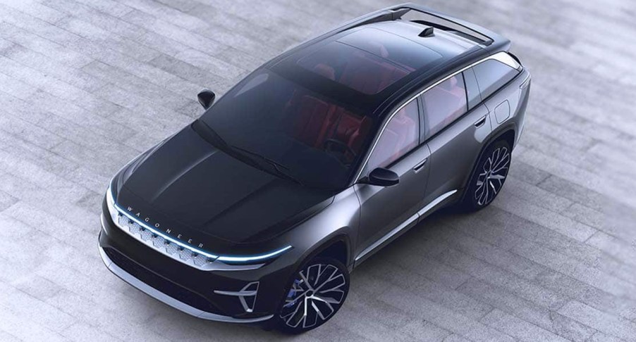 A black Jeep Wagoneer S fully-electric full-size SUV is parked.