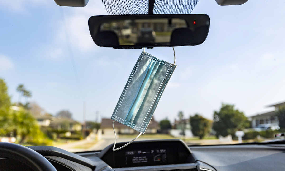 Is It Illegal to Drive With a Facemask Hanging From Your Rearview Mirror?