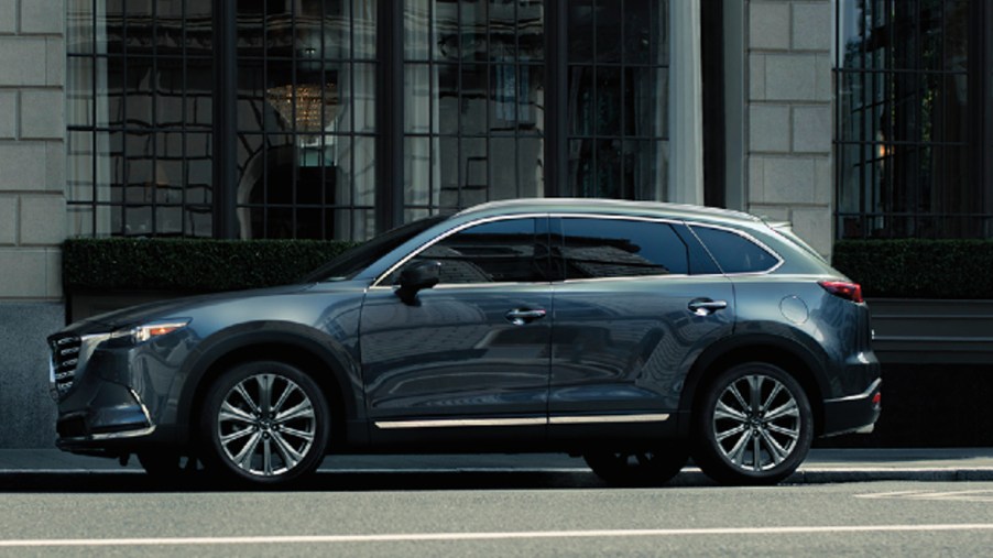 A gray 2023 Mazda CX-9 midsize SUV is parked.
