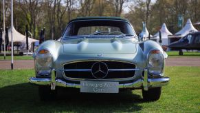 A Mercedes-Benz 300SL with old-fashioned headlights and grille at Salon Prive London at the Royal Chelsea Hospital
