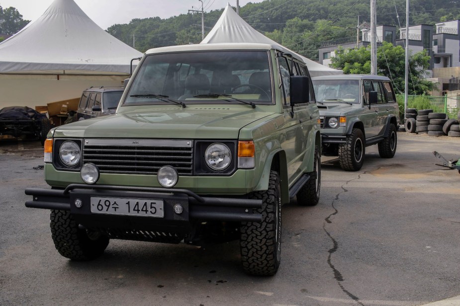 Two vintage Mitsubishi Pajero SUVs with a high resale value because of their timeless design and 4x4 4WD drivetrain.