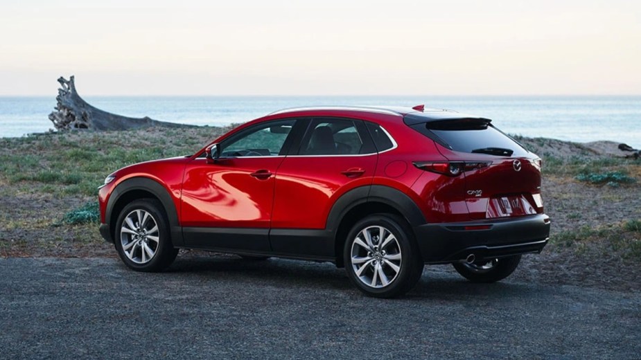 Rear angle view of red 2022 Mazda CX-30