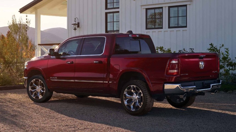 Rear angle view of red 2023 Ram 1500, full-size pickup truck alternative to Ford F-150 costing under $37,000