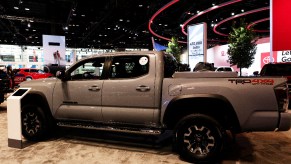 A 2023 Toyota Tacoma TRD Off-Road is shown off at an auto show.