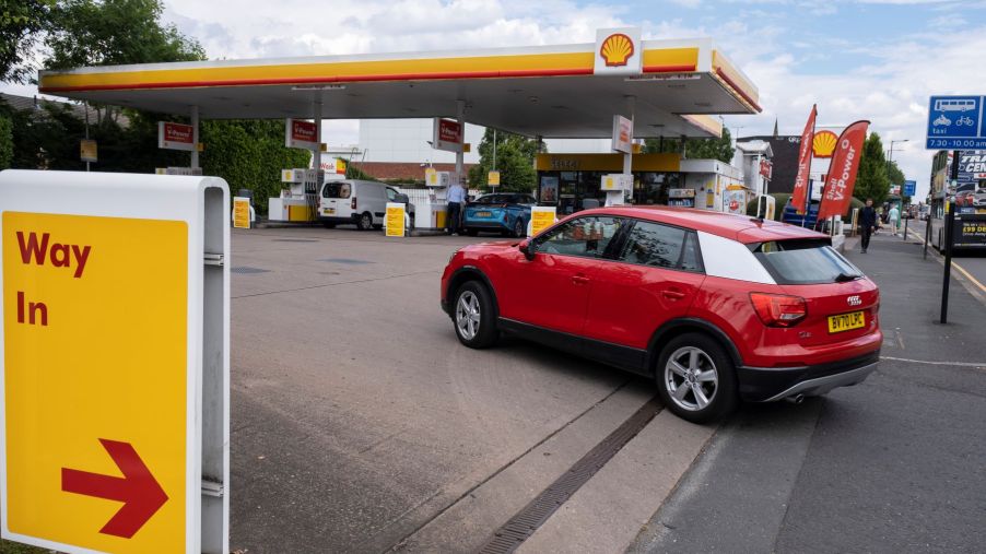 A car driving into a petrol/gas station in Birmingham, United Kingdom (U.K.)