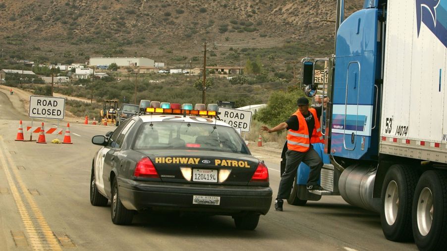 A highway road rage incident closure due to a gun shooting stopping trucker traffic near Wrightwood, California