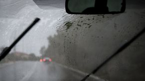 Windshield wipers battling rainfall in Chania, Greece