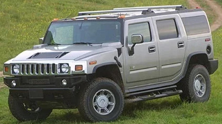 Silver 2003 Hummer H2 Parked on Grass