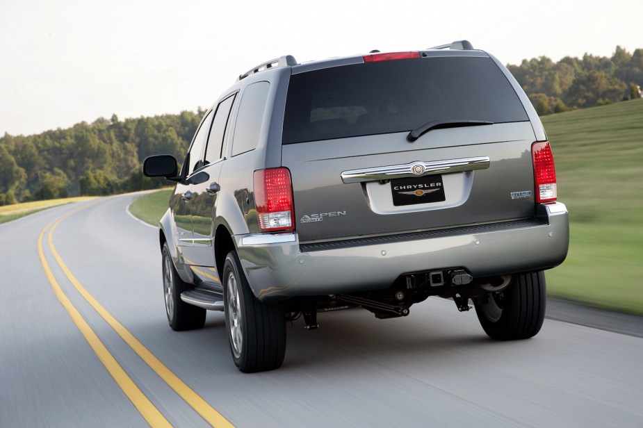 Publicity image of the rear of a Chrysler Aspen hybrid luxury SUV offered in 2009 and canceled shortly thereafter.