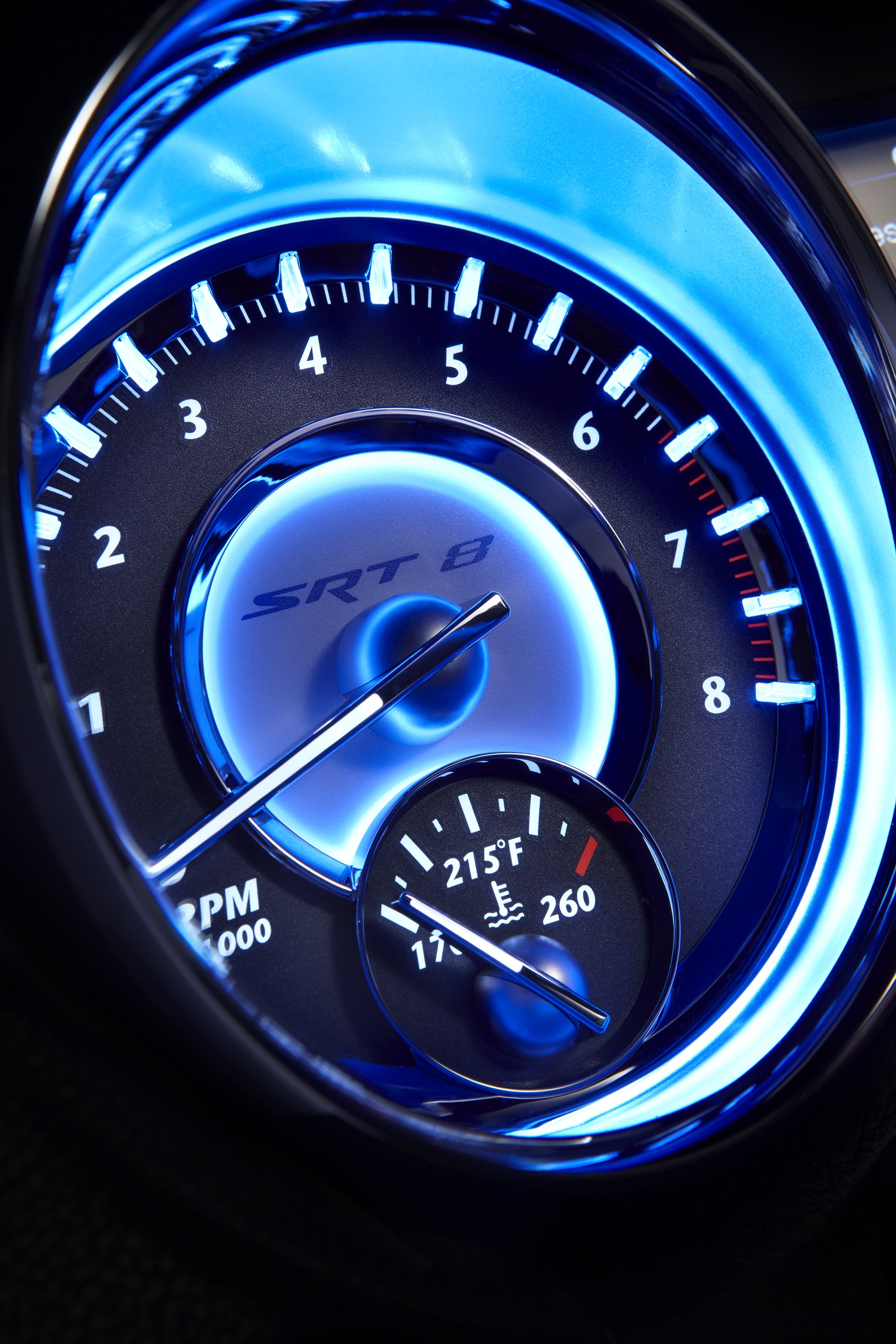 The 300 SRT's bright blue gauges are a sight. 