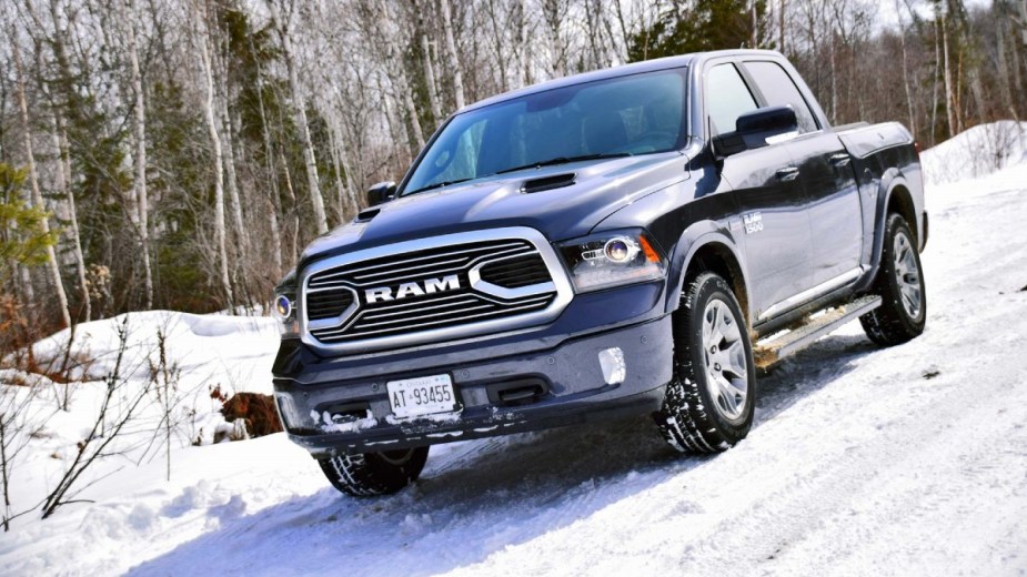 Blue 2018 Ram 1500 on a snow-covered hill
