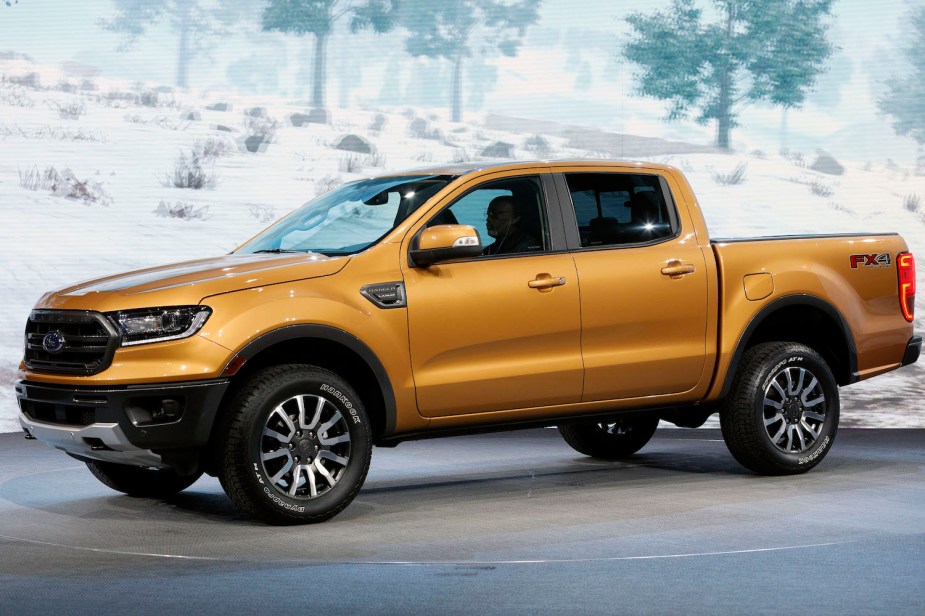 The new 2019 Ford Ranger reliable midsize pickup truck on stage at an auto show during its launch.