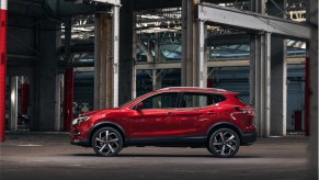 2021 Nissan Rogue Sport in red in a warehouse