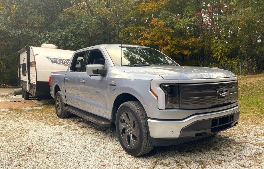 2022 Ford F-150 Lightning towing a camper