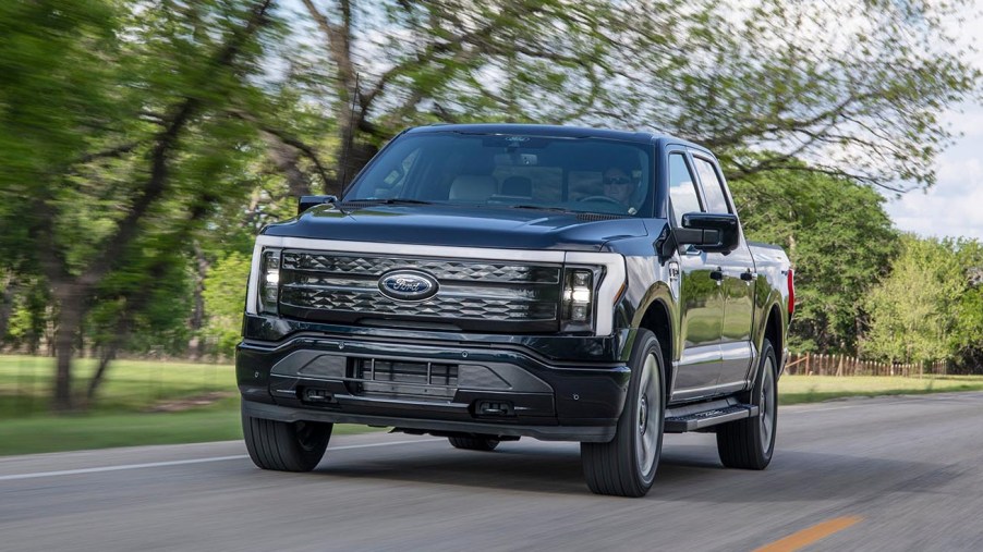 2022 Ford F-150 Lighting driving on the road