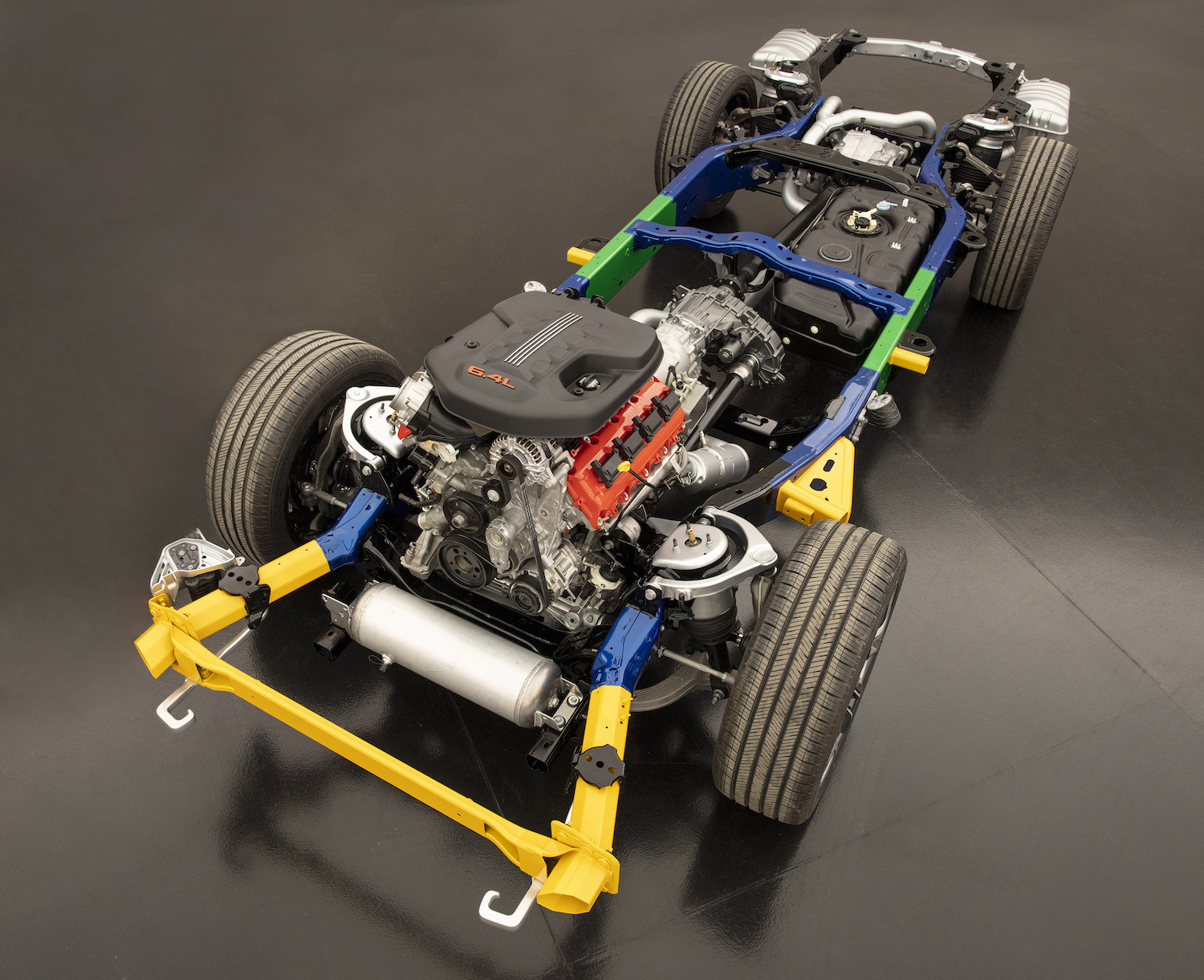 Stripped Wagoneer frame and 6.4-liter V8 engine borrowed from a Ram truck.