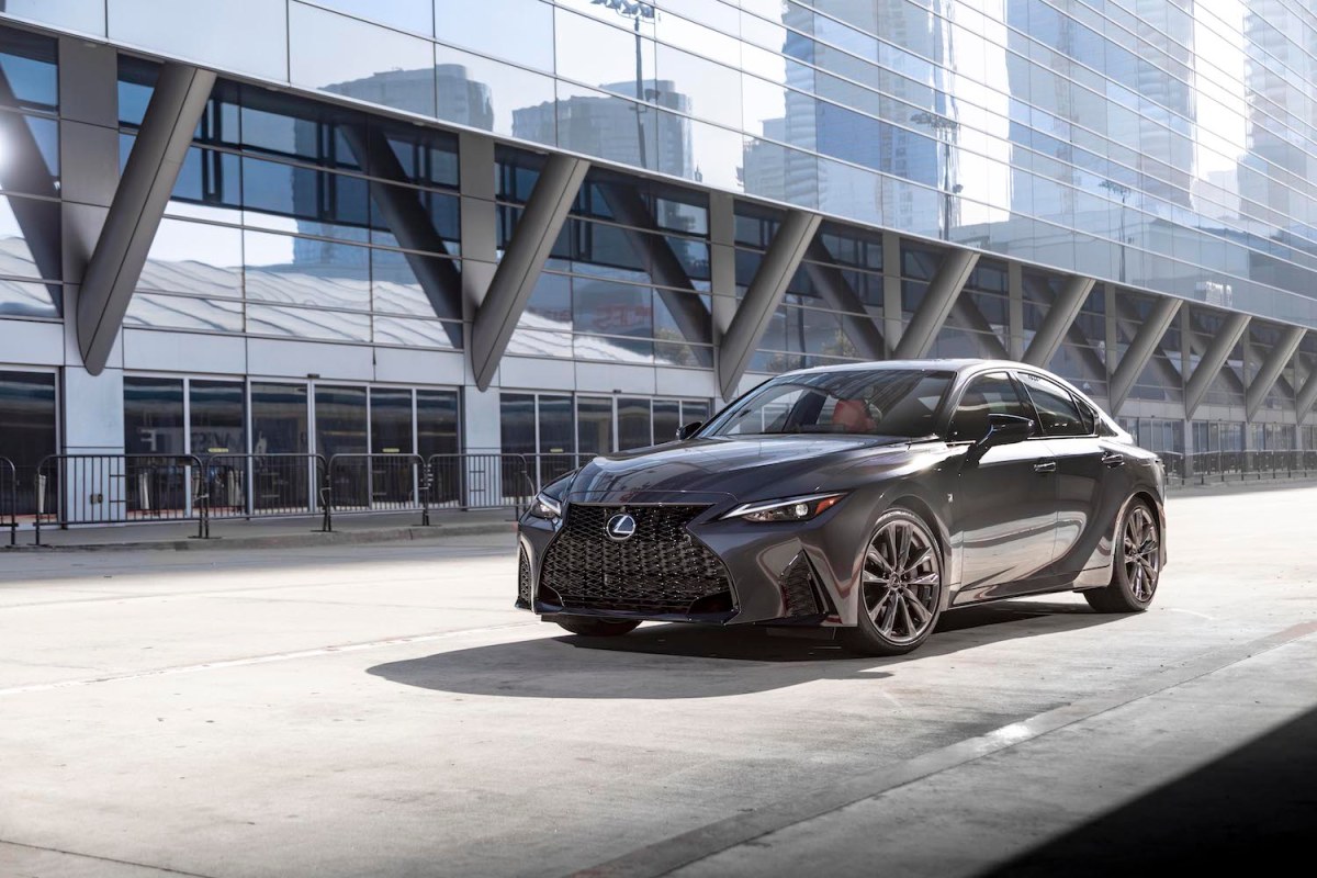 A dark grey 2022 Lexus IS midsize luxury sedan parked
