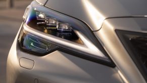 Close-up on the headlight of a 2022 Lexus LS, one of the quietest cars