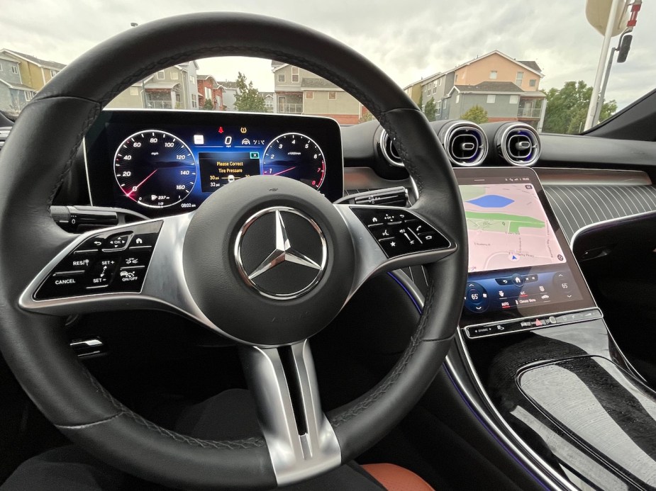 A view of the steering wheel and dashboard.