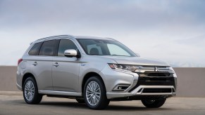 A silver 2022 Mitsubishi Outlander parked outdoors.
