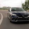A black 2022 Toyota Camry shows off its aggressive front-end styling.