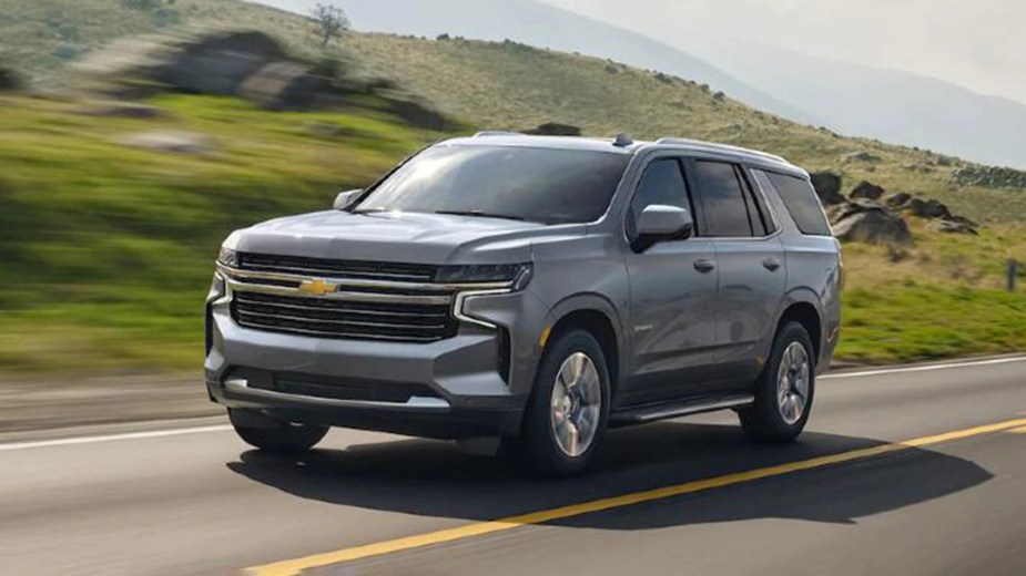 The 2022 Chevy Tahoe driving on the road