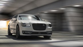 A white 2023 Chrysler 300C Limited Edition driving