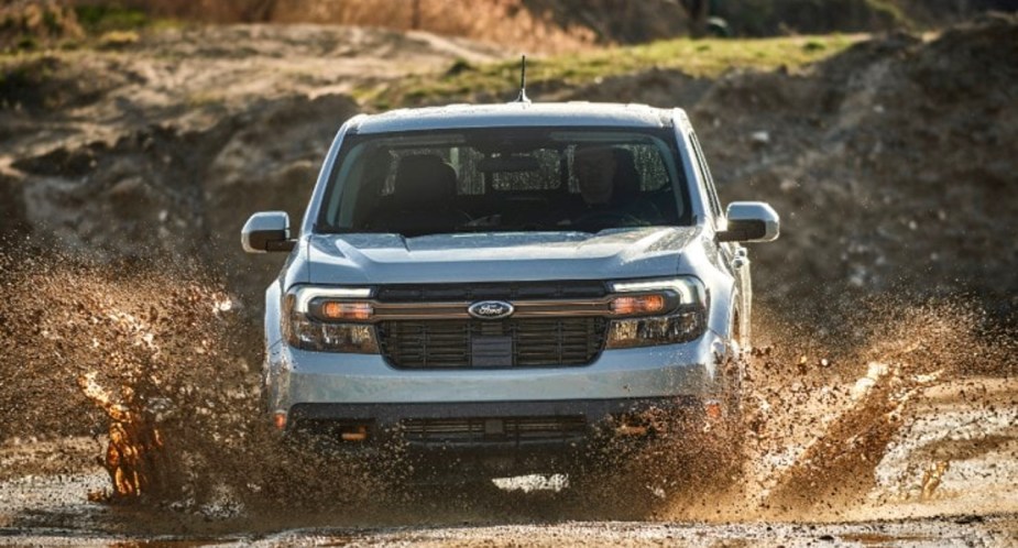 A gray 2023 Ford Maverick Tremor is driving off-road. 