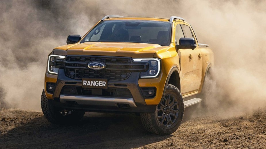 The yellow 2023 Ford Ranger is on the road