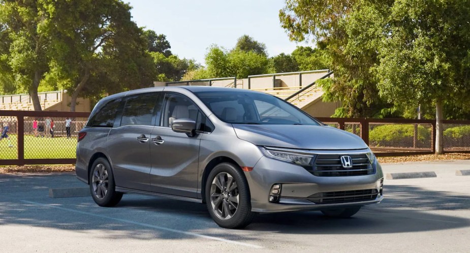 A gray 2023 Honda Odyssey minivan is parked, is it the most reliable model?