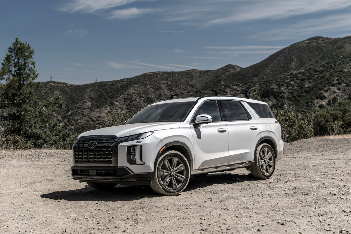 A white 2023 Hyundai Palisade full-size SUV parked outdoors