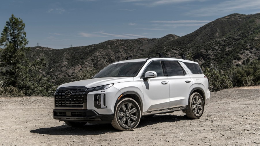 A white 2023 Hyundai Palisade full-size SUV parked outdoors