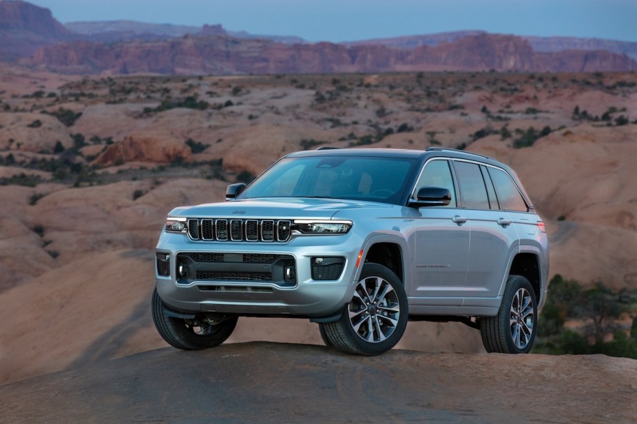 Silver 2023 Jeep Grand Cherokee 4xe in the desert. 