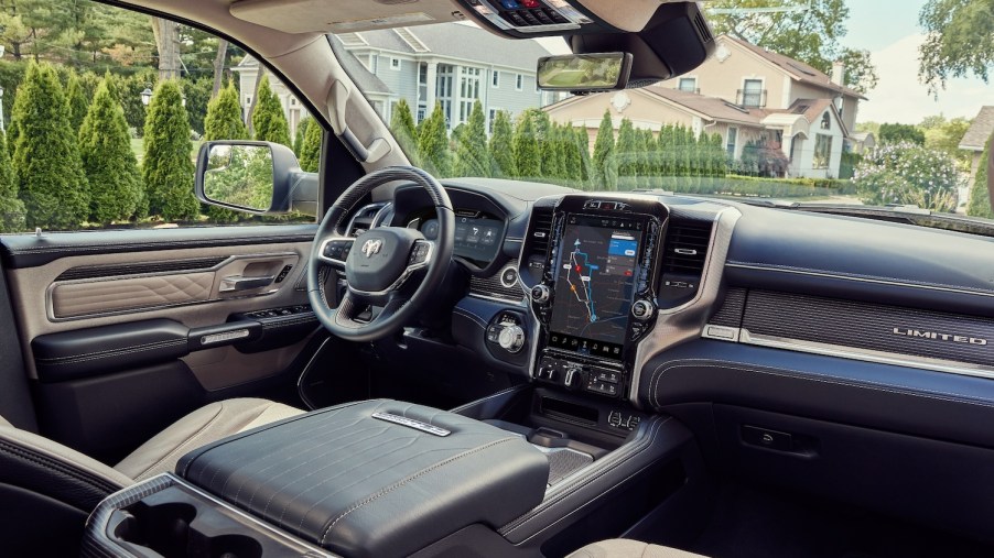The interior of the Ram 1500 Limited Elite Edition luxury pickup truck with quilted leather seats and suede headline.