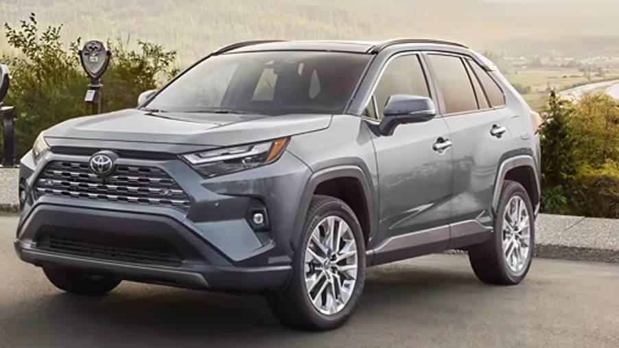 A gray 2023 Toyota RAV4 is parked.