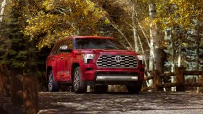 A red 2023 Toyota Sequoia full-size SUV is parked outdoors.