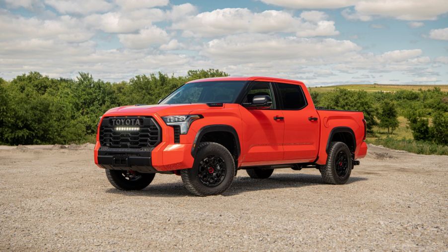 A 2023 Toyota Tundra TRD Pro full-size pickup truck with a hybrid powertrain and Solar Octane color option