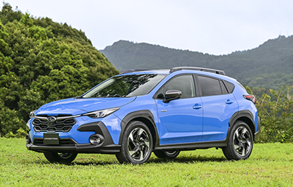 A 2024 Subaru Crosstrek sits in an open field. Showing off some updates to this SUV.