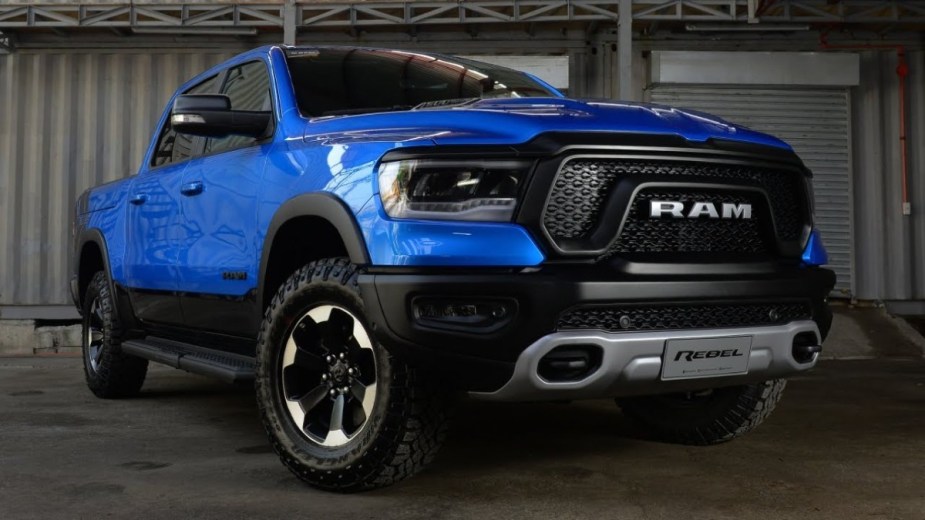Blue Ram 1500 Rebel in a garage, this Ram off-road pickup is ready to go