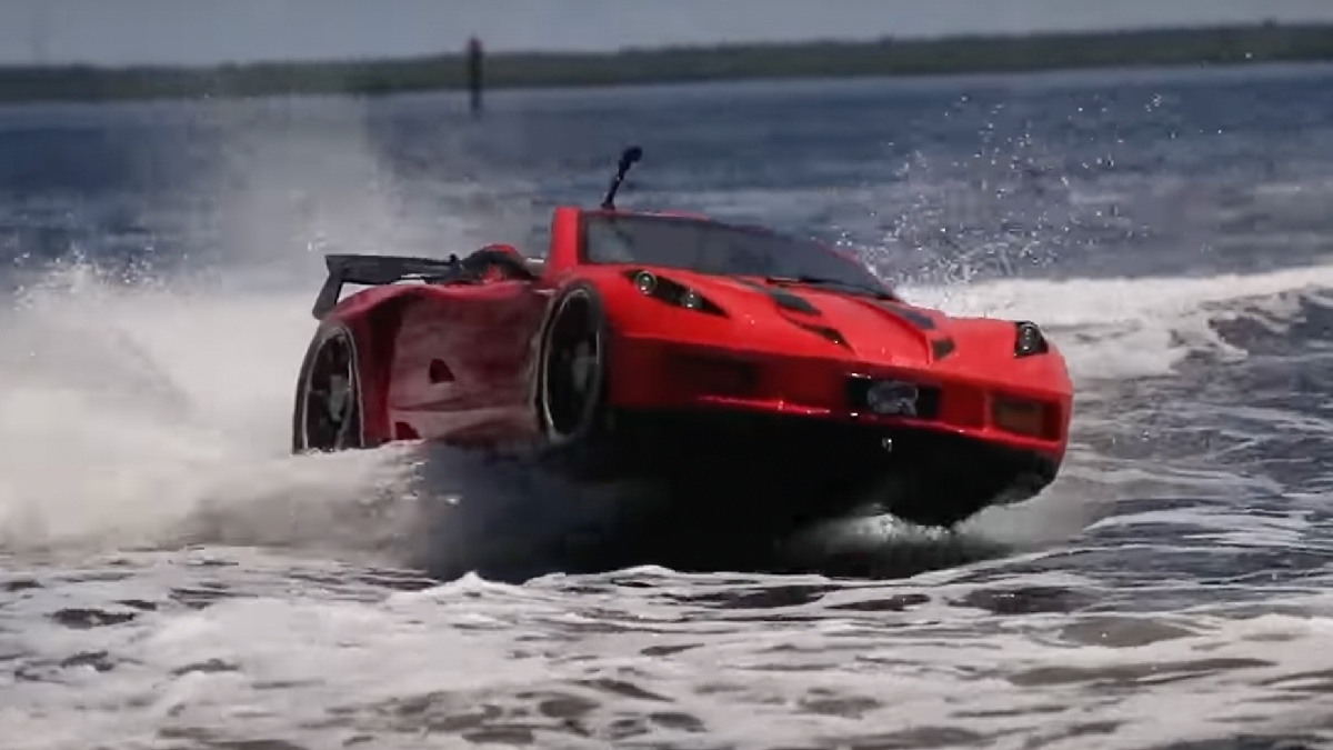 C7 Corvette jet car boat cruising over waves as it's chased by the water police in Florida