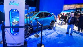 A Ford Escape PHEV plugged into a charging station at the 2020 Canadian International Autoshow