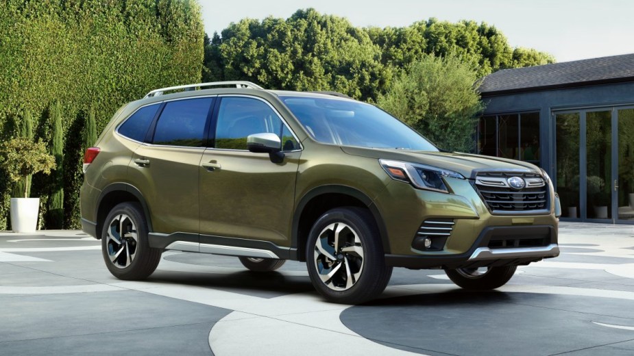 Front angle view of Cascade Green Silica 2023 Subaru Forester crossover SUV