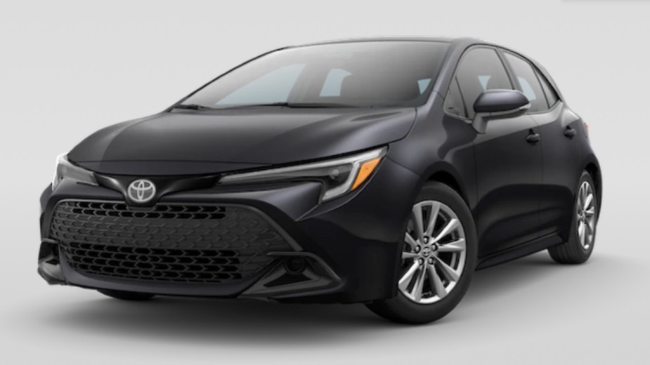 Front angle view of Midnight Black Metallic 2023 Toyota Corolla Hatchback