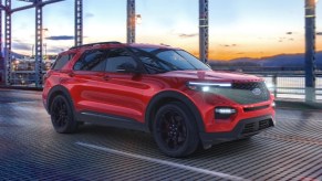 Front angle view of Rapid Red 2023 Ford Explorer midsize SUV