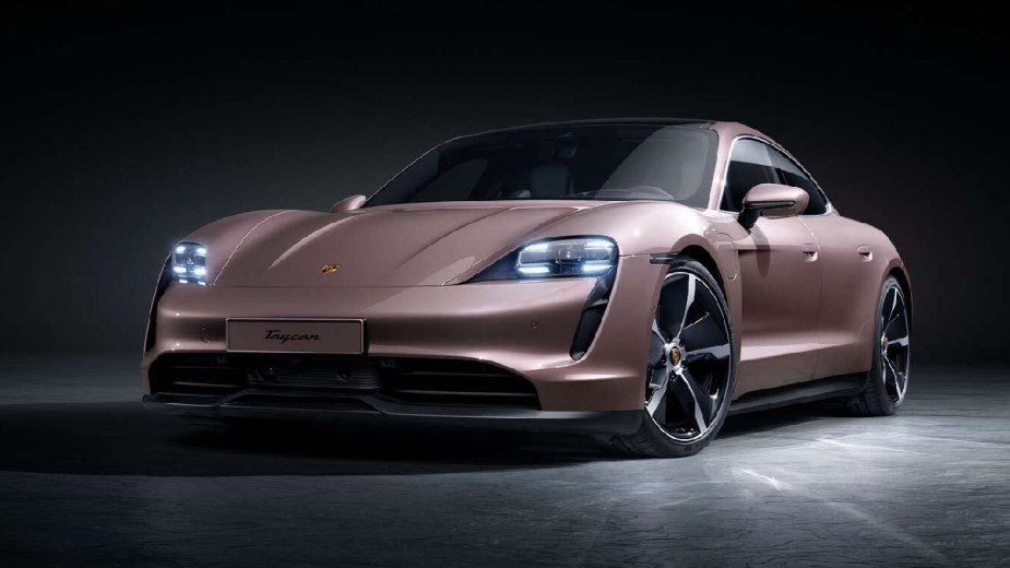 Front angle view of brown 2023 Porsche Taycan, fast EV alternative that costs less than Tesla Model S
