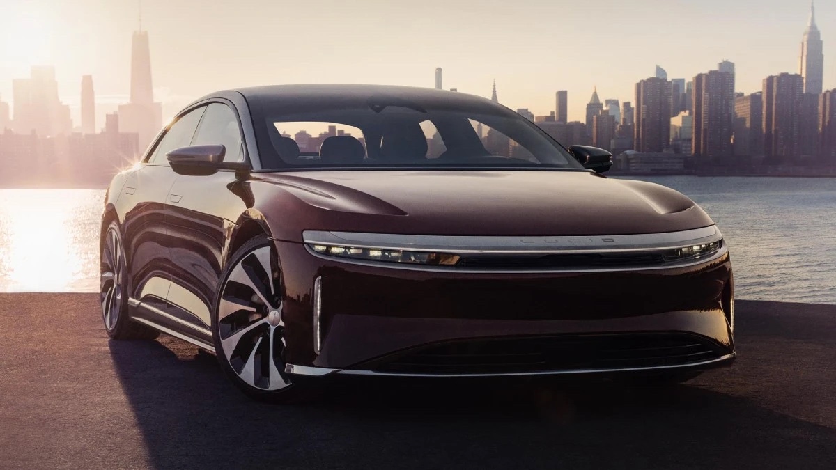 Front angle view of the 2023 maroon Lucid Air, an electric car alternative that costs less than the Tesla Model S