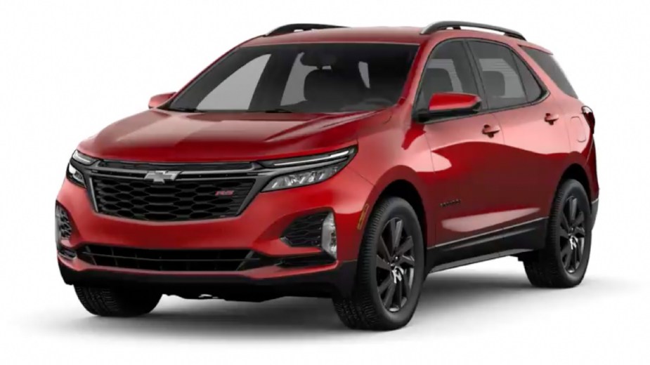 Front angle view of new 2023 Chevy Equinox crossover SUV with Radiant Red Tintcoat exterior paint color